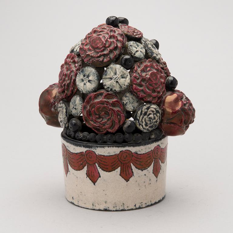 A stoneware sculpture, signed Kaipiainen Arabia.