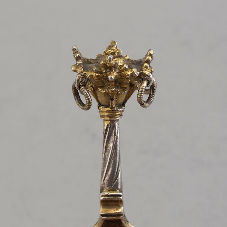 A Nordic parcel-gilt silver spoon dated 1586.