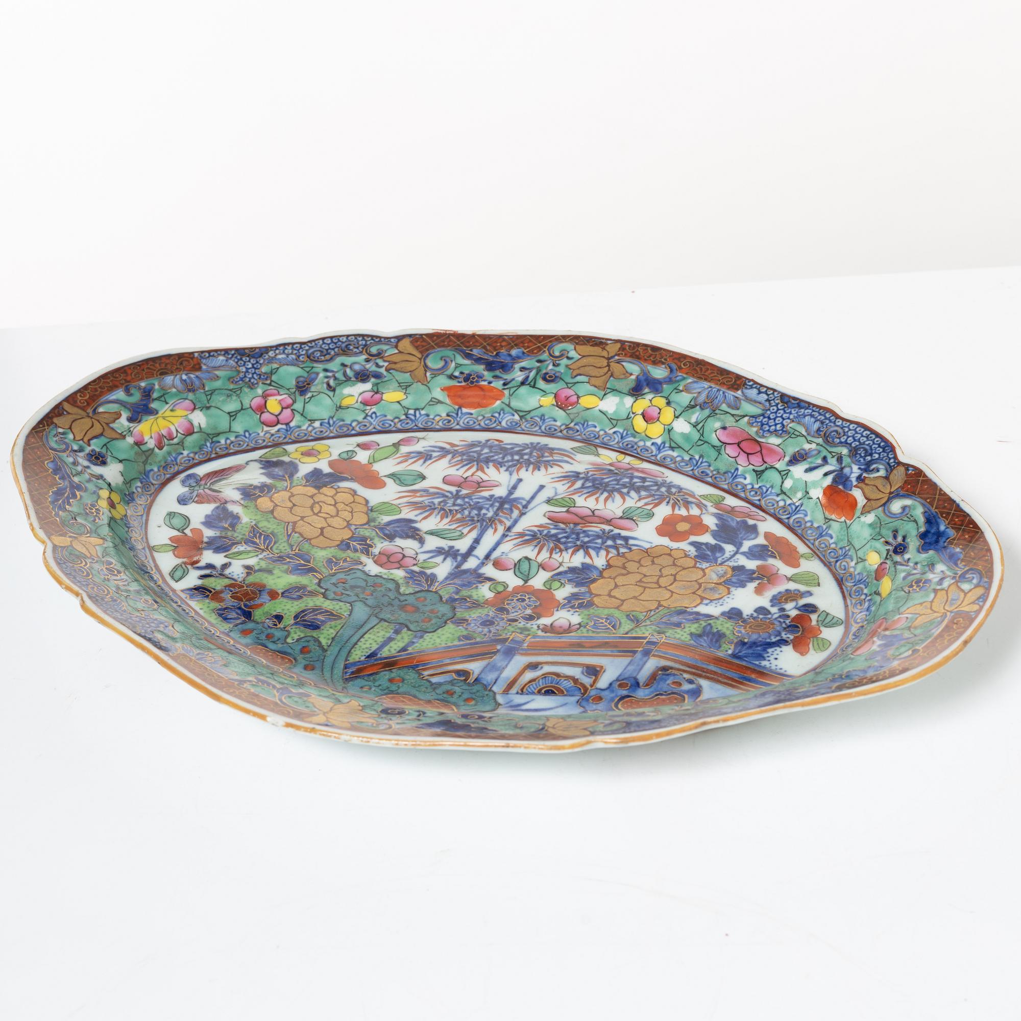 Two Chinese blue and white porcelain dishes and a small dish, Qing dynasty, 18th century.