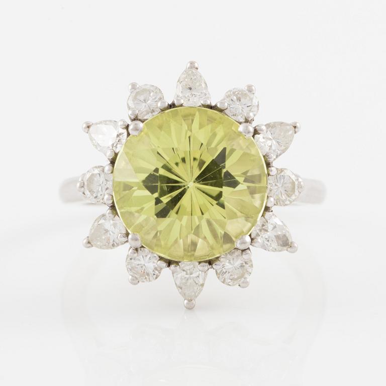 Ring, in the form of a flower, platinum with chrysoberyl and drop-cut and brilliant-cut diamonds.