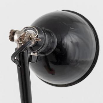 A industrial wall lamp 'Stella' from the first half of the 20th century.