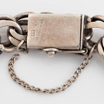 Silver bracelet.