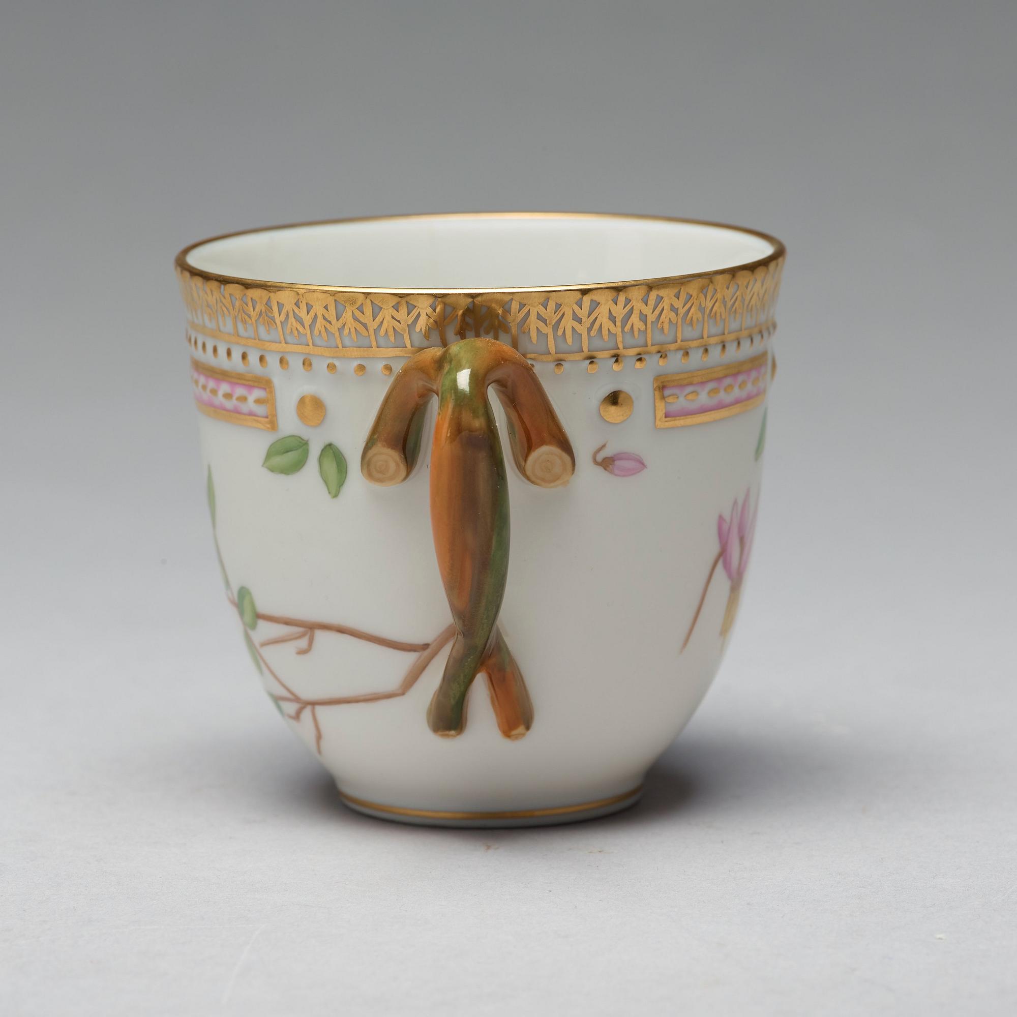 A set of four Royal Copenhagen 'Flora Danica' coffee cups with saucers, Denmark, 20th Century.