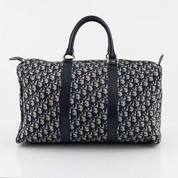 Christian Dior, a canvas weekend bag.