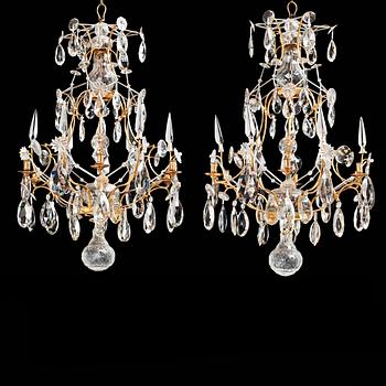 A pair of Swedish Rococo 18th century six-light chandeliers by Olof Westerberg dated 1789 and 1790.