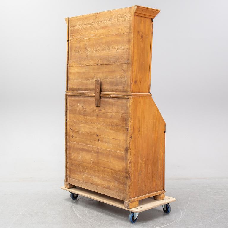 A pine cabinet, circa 1800.