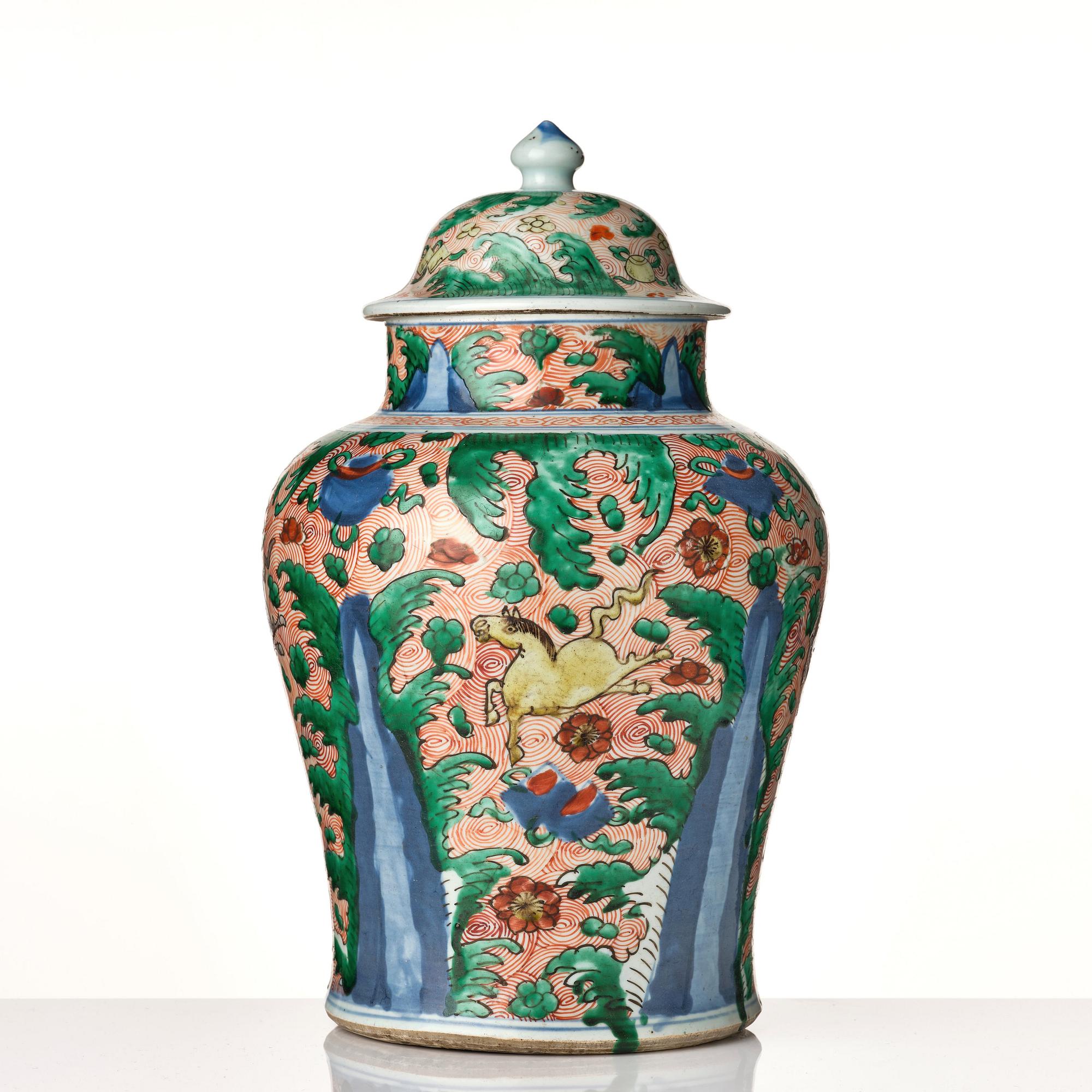 A pair of Transitional Wucai jars, 17th Century.