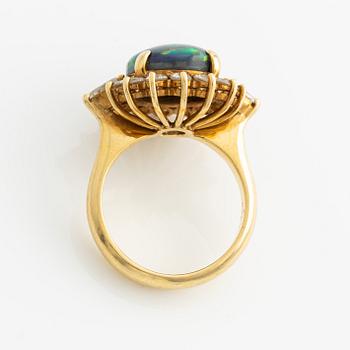 Ring, gold with opal and brilliant and drop-cut diamonds.