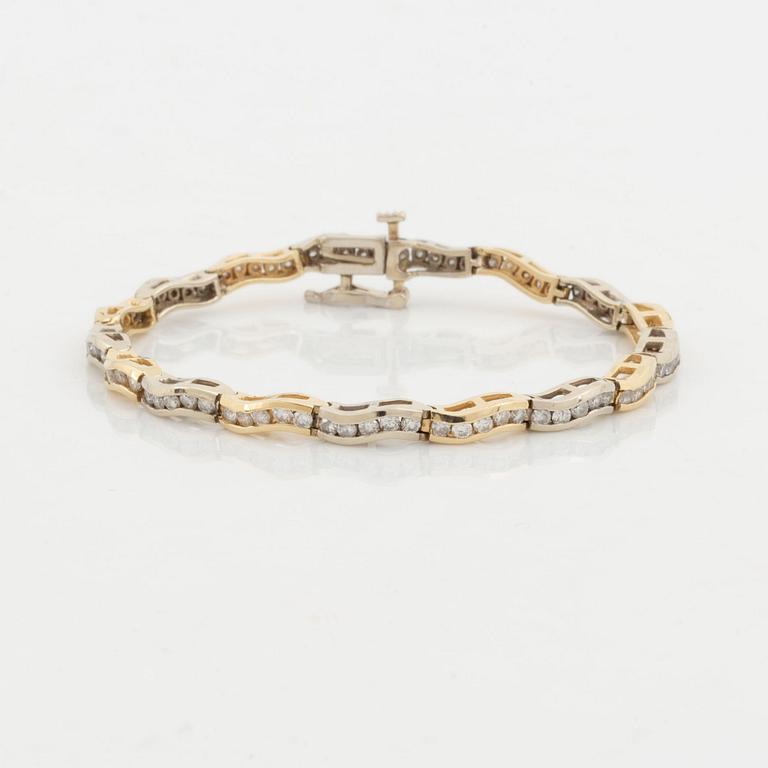 14K gold and brilliant cut diamond bracelet, with extra link.