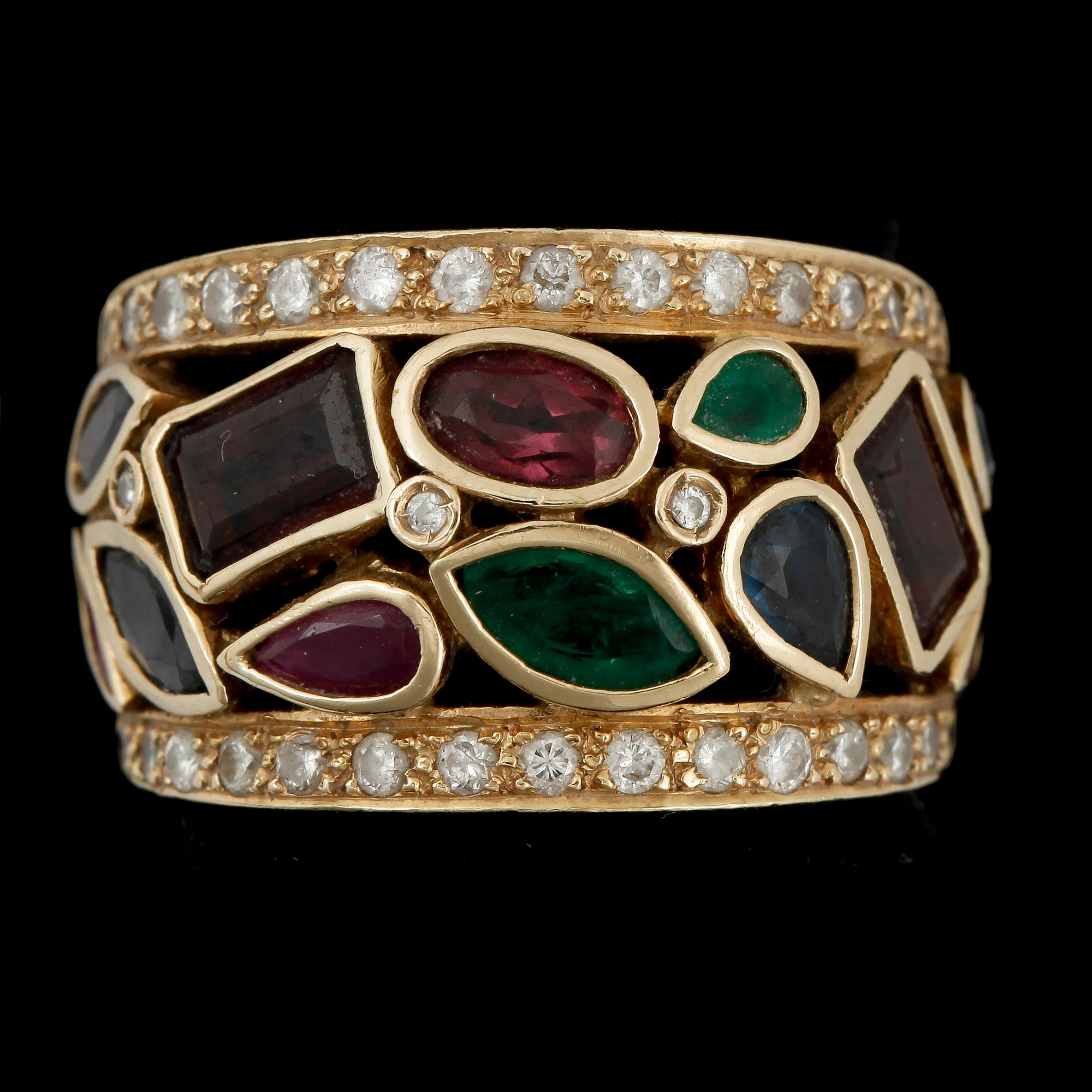 RING, 18k guld med diamanter och bla smaragder, rubiner och safirer. Vikt ca12g.