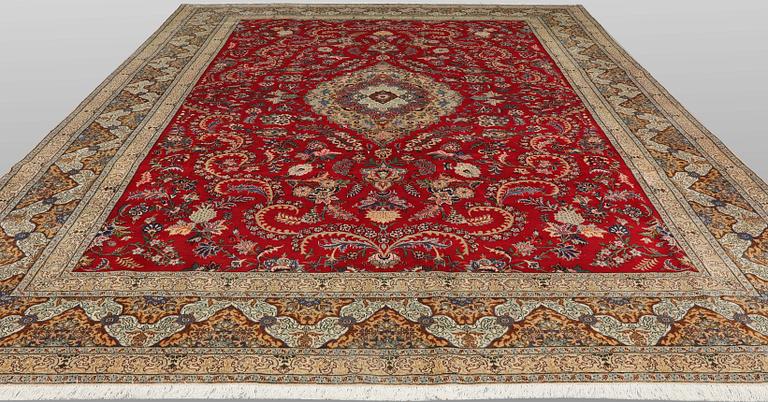 A Keshan carpet, approx. 415 x 300 cm.