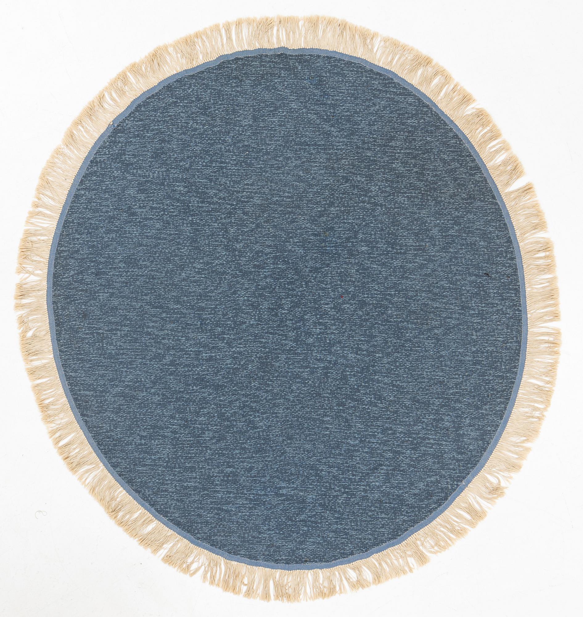 A rug, diameter circa 188 cm.