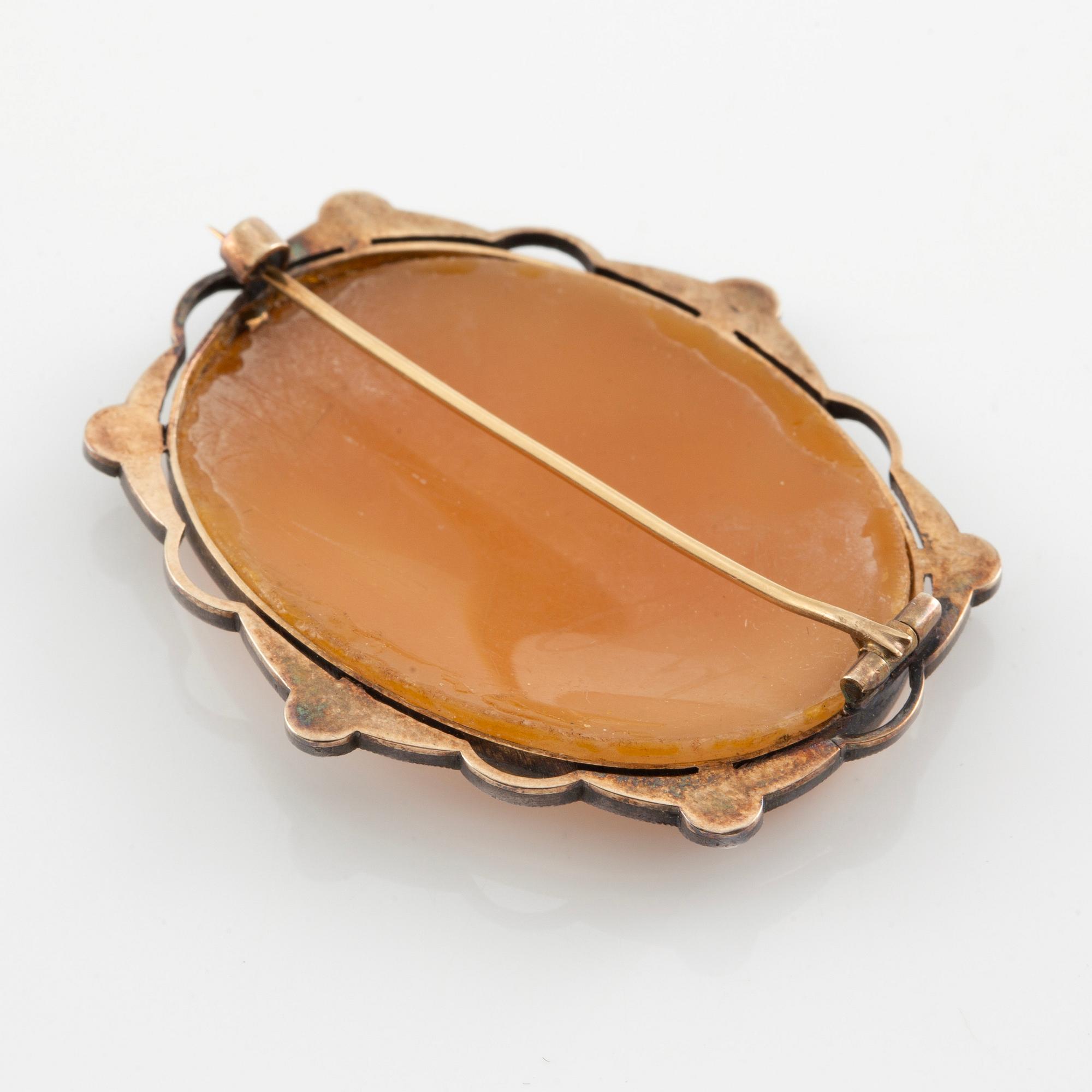 Brooch with a shell cameo, silver and 14K gold with rose-cut diamonds.