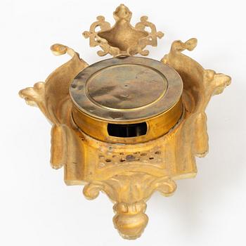 A bronze wall clock, Louis XVI style, France, circa 1900.