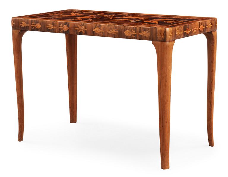 A Carl Malmsten mahogny table with inlays of different exotic woods, Sweden 1935.