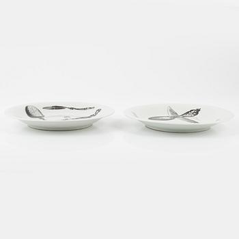 Piero Fornasetti, a pair of porcelain 'Posate Rinascimento' dishes, Fornasetti, Italy.