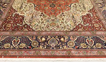 A Tabriz carpet, so called 40 Raj, c. 396 x 296 cm.