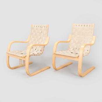 Alvar Aalto, a pair of late 20th century armchairs model 406 Artek.