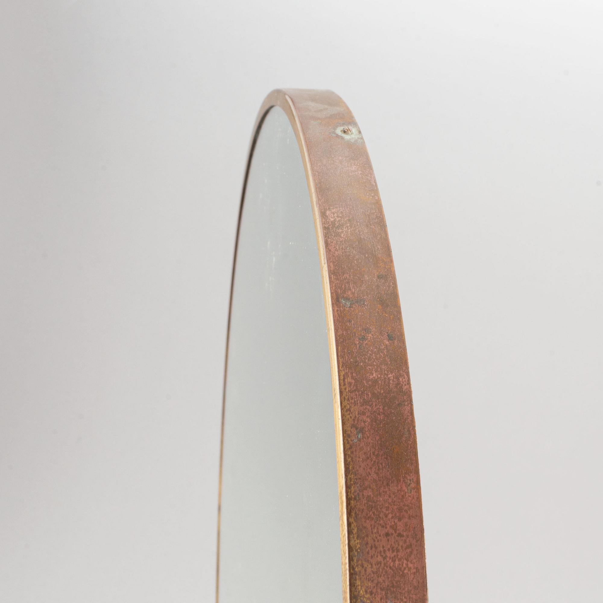 A model 2214 brass table mirror by Josef Frank for Firma Svenskt Tenn.