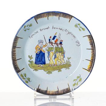 A group of ten French revolution faiance plates, 1790s.