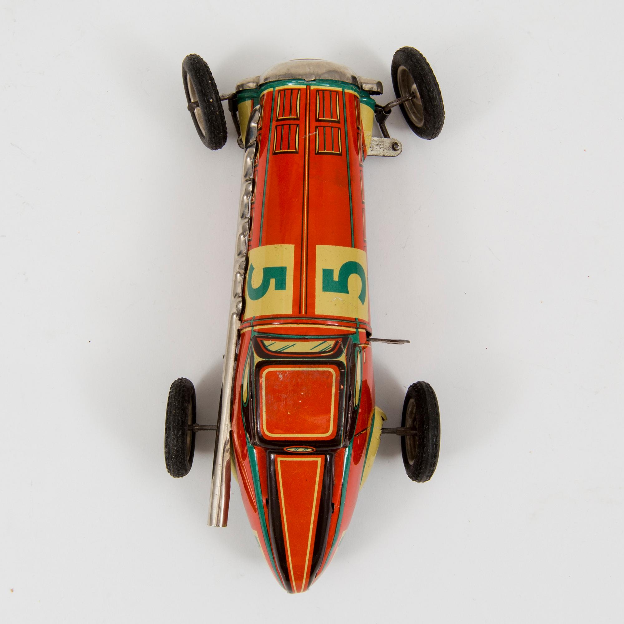 A JNF tinplate racing car 1930/40s.