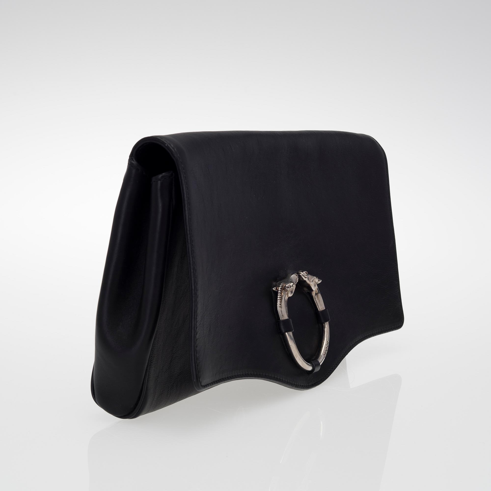 A LEATHER RIBOT HORSE HEAD CLUTCH.