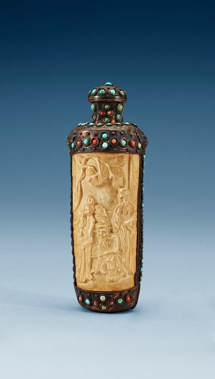 A turquoise inlayed metal framed ivory flask, late Qing dynasty (1644-1911).