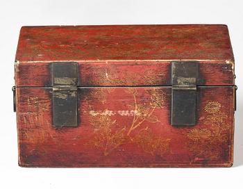 A set of two gilt decorated leather clad wooden chests, late Qing dynasty.