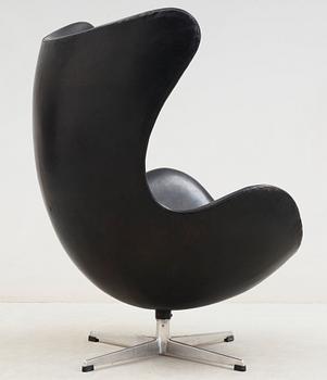 An Arne Jacobsen black leather 'Egg' chair, Fritz Hansen, Denmark 1960's.