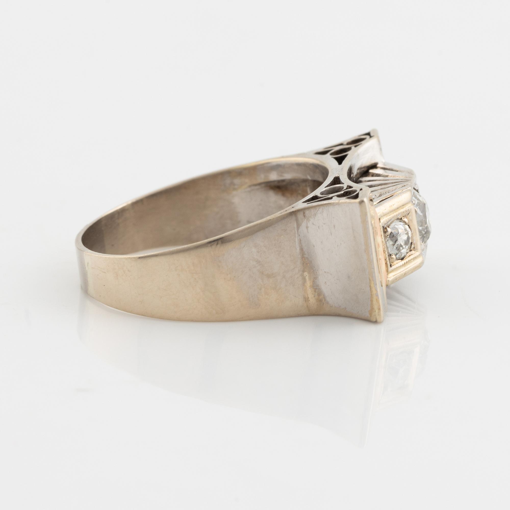 A 14K gold ring set with old-cut diamonds.