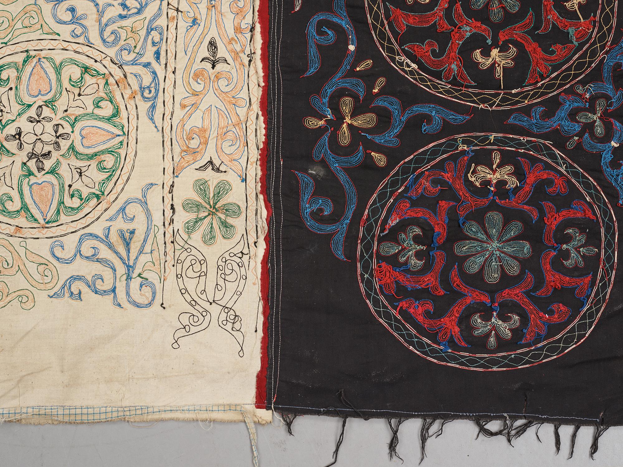 A Suzani textile, ca 247 x 128 cm.
