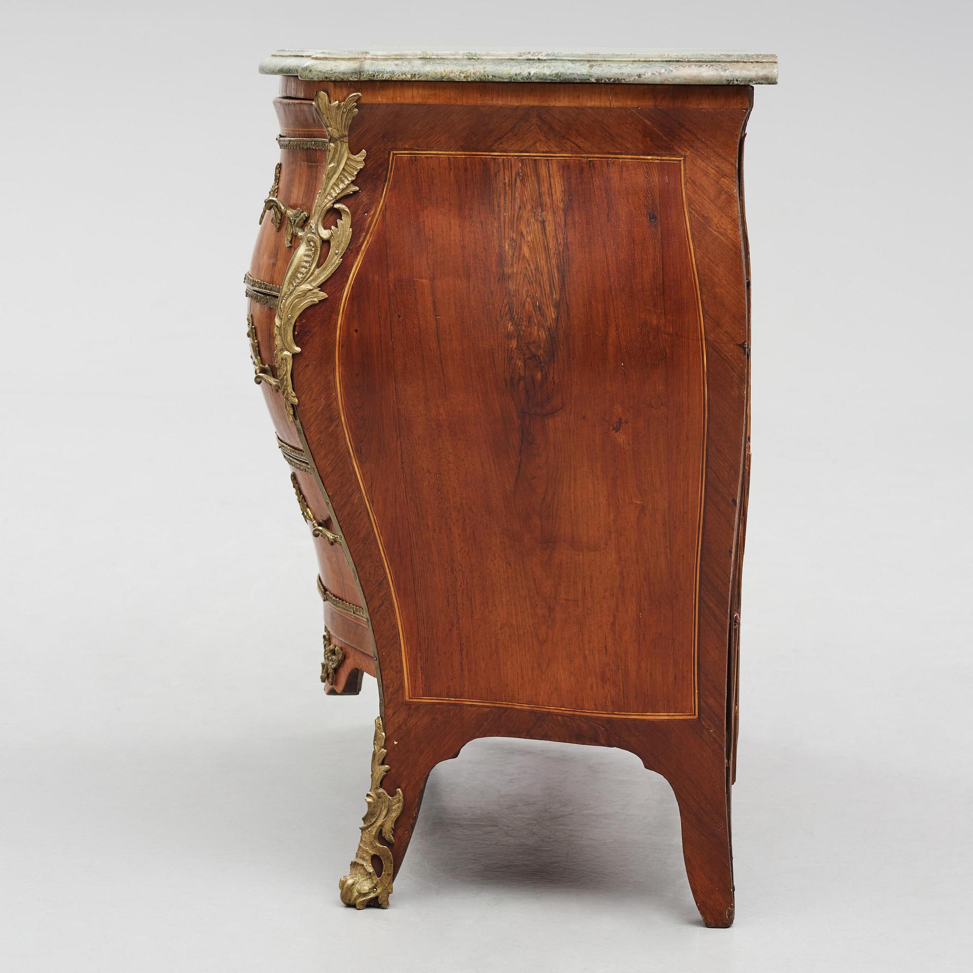A Swedish rococo parquetry commode by L. Nordin (master in Stockholm 1743-73).