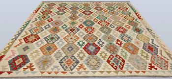 A Kilim carpet, approx. 293 x 254 cm.