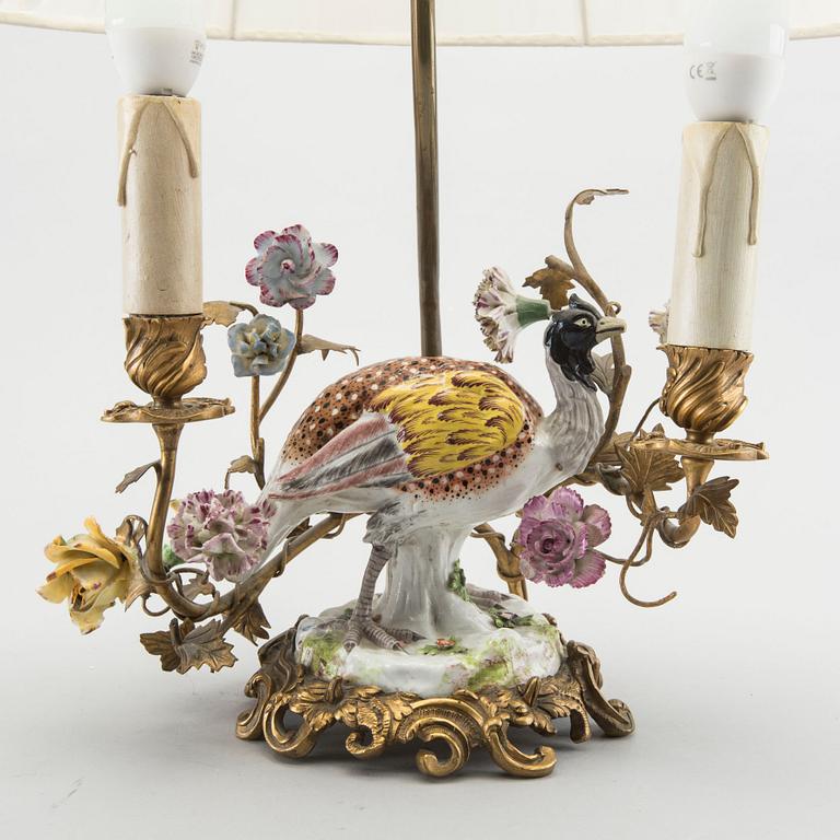 A Meissen porcelain figurine mounted as lamp.