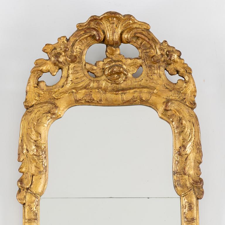 A mid 20th century Rococo style mirror.