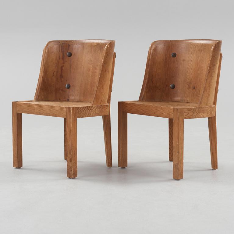 A pair of Axel Einar Hjorth 'Lovö' stained pine armchairs, Nordiska Kompaniet, Sweden 1930's.