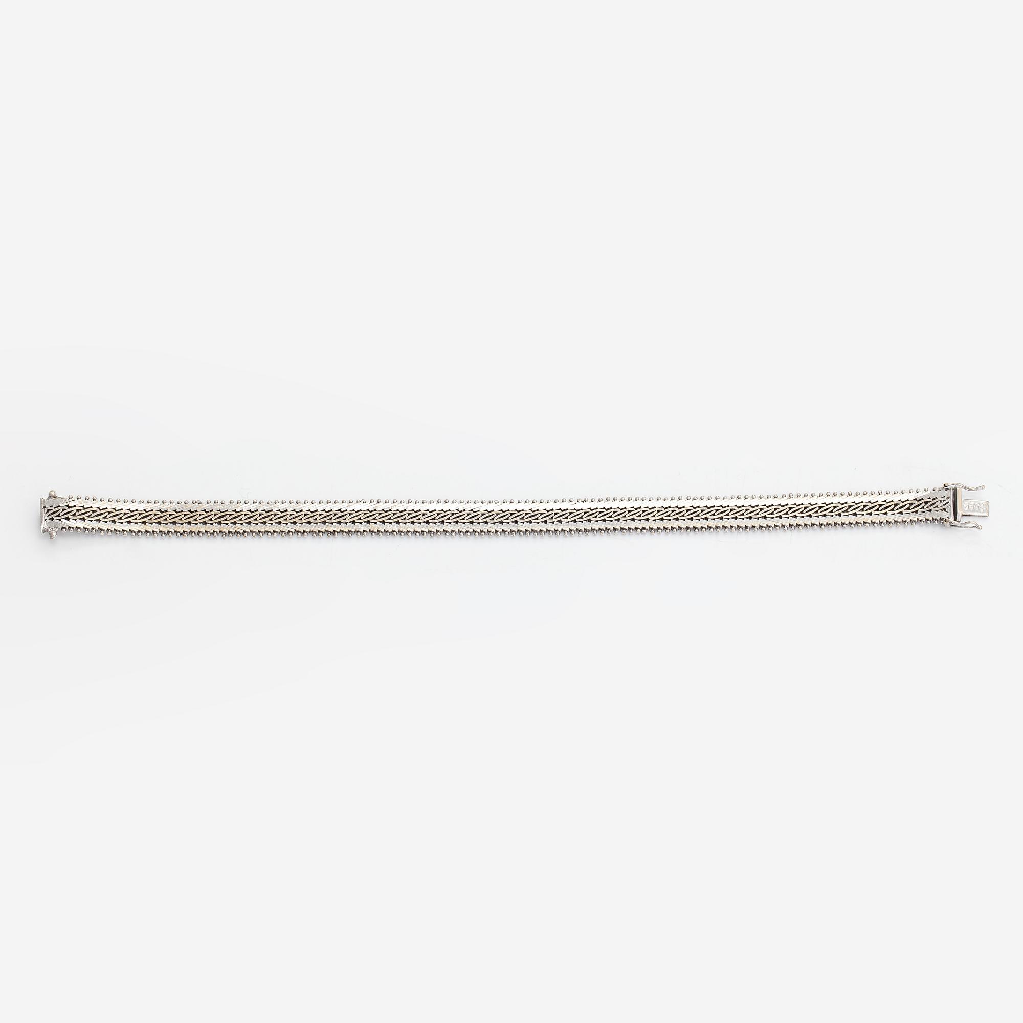 A 14K whitegold bracelet, Finnish importmarks Turun Kultaseppä Oy 1974.