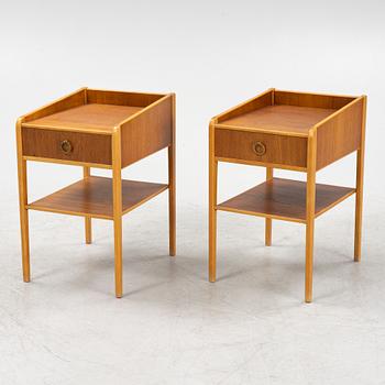 A pair of teak veneered bedside table, mid 20th Century.