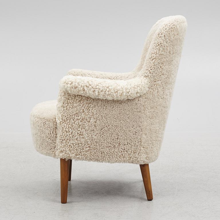 Carl Malmsten, a "Husmor" armchair, O.H.Sjögren, Tranås, 1984.