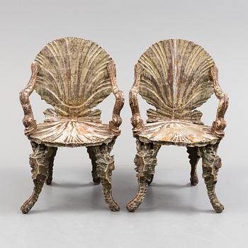 A pair of 20th century grotto armchairs.