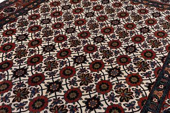 An antique Veramin carpet, West Persia, 380 x 271 cm.