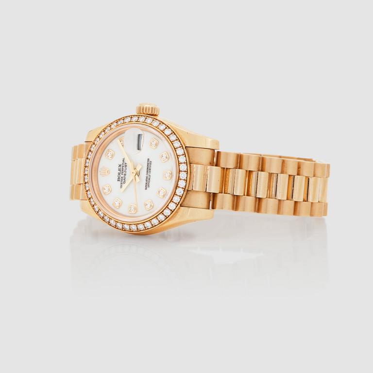 A Rolex Datejust ladie's wristwatch. 18K gold. Automatic. Ø 26 mm. Made circa 2008.