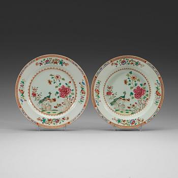 A set of four deep and four flat famille rose 'double peacock' dishes, Qing dynasty, Qianlong (1736-1795).