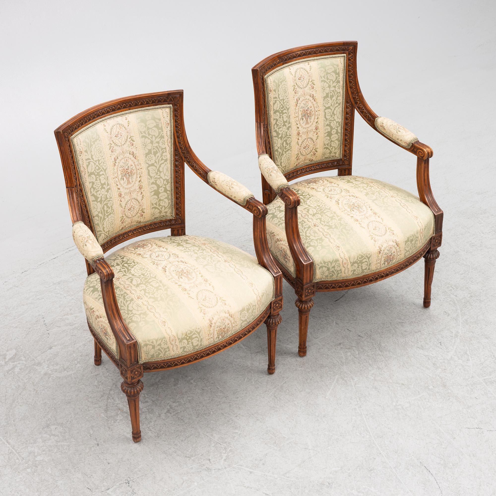 A pair of late Gustavian open armchairs, Stockholm, late 18th century.