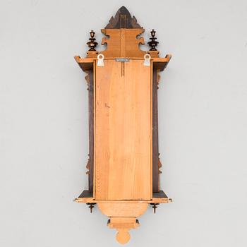 A neo renaissance German Junghans wall clock from around the turn of the 20th Century.