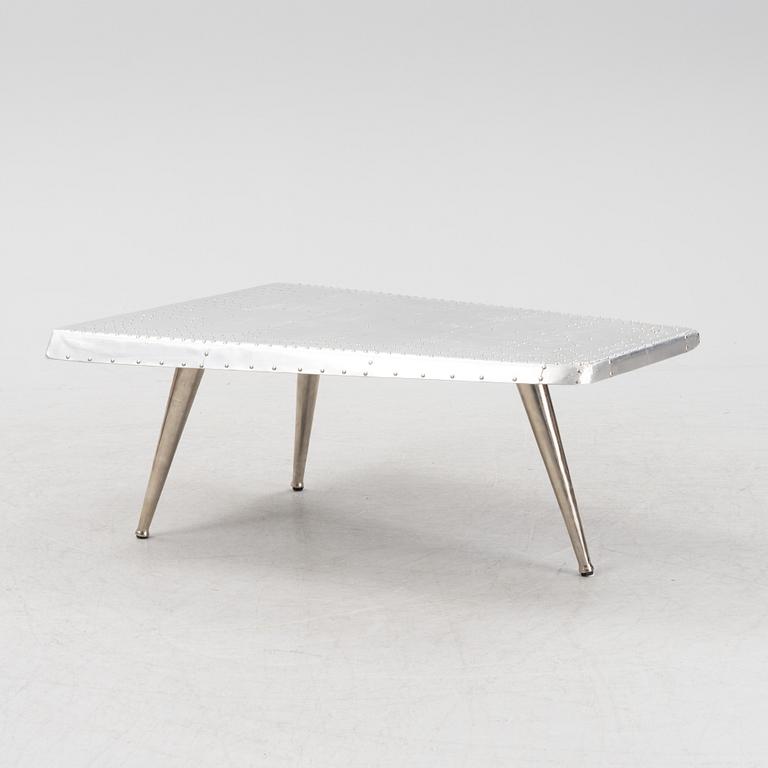 A coffee table constructed by a plane wing, second half of the 20th Century.