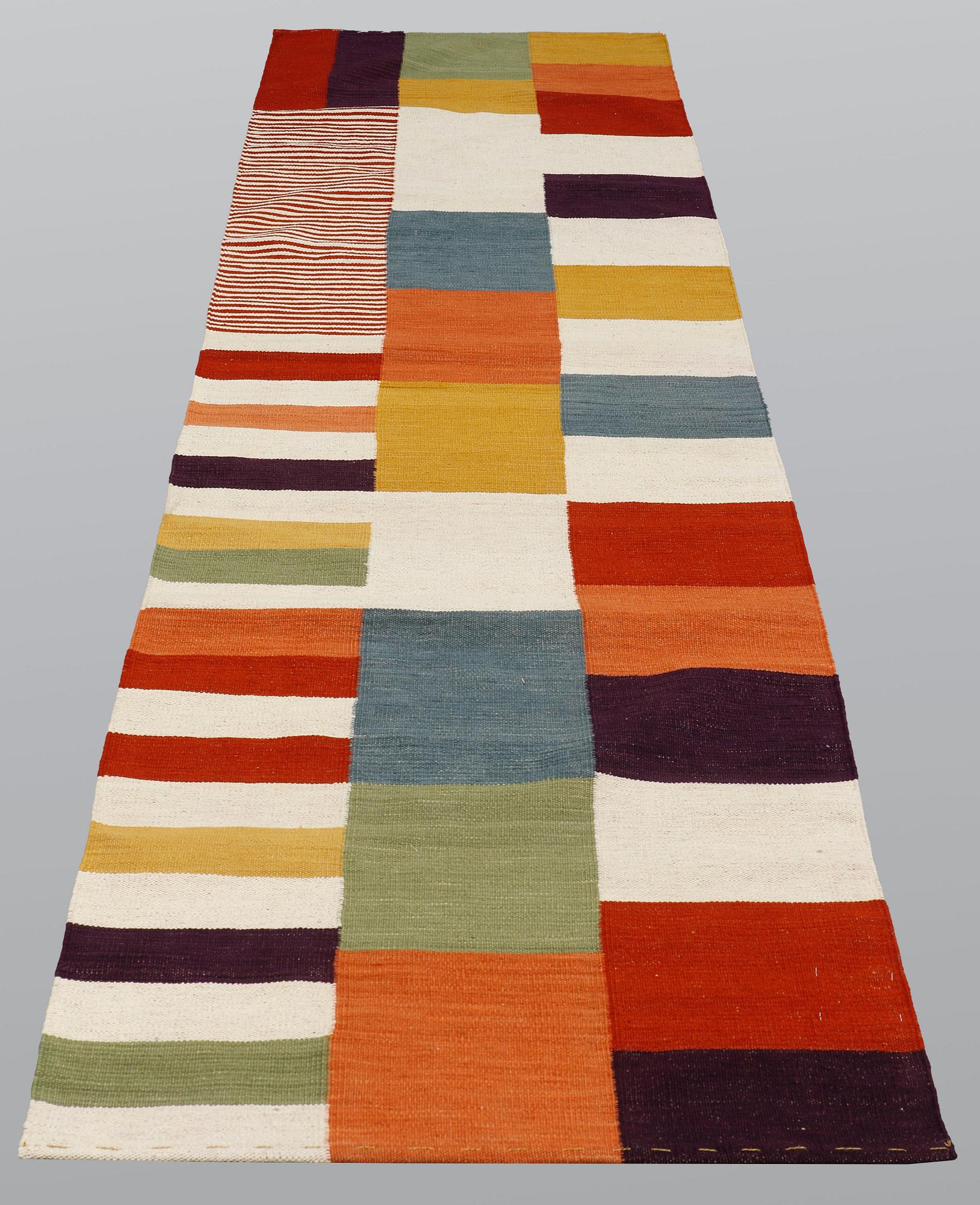 A runner, flat weave, ca 335 x 85 cm.