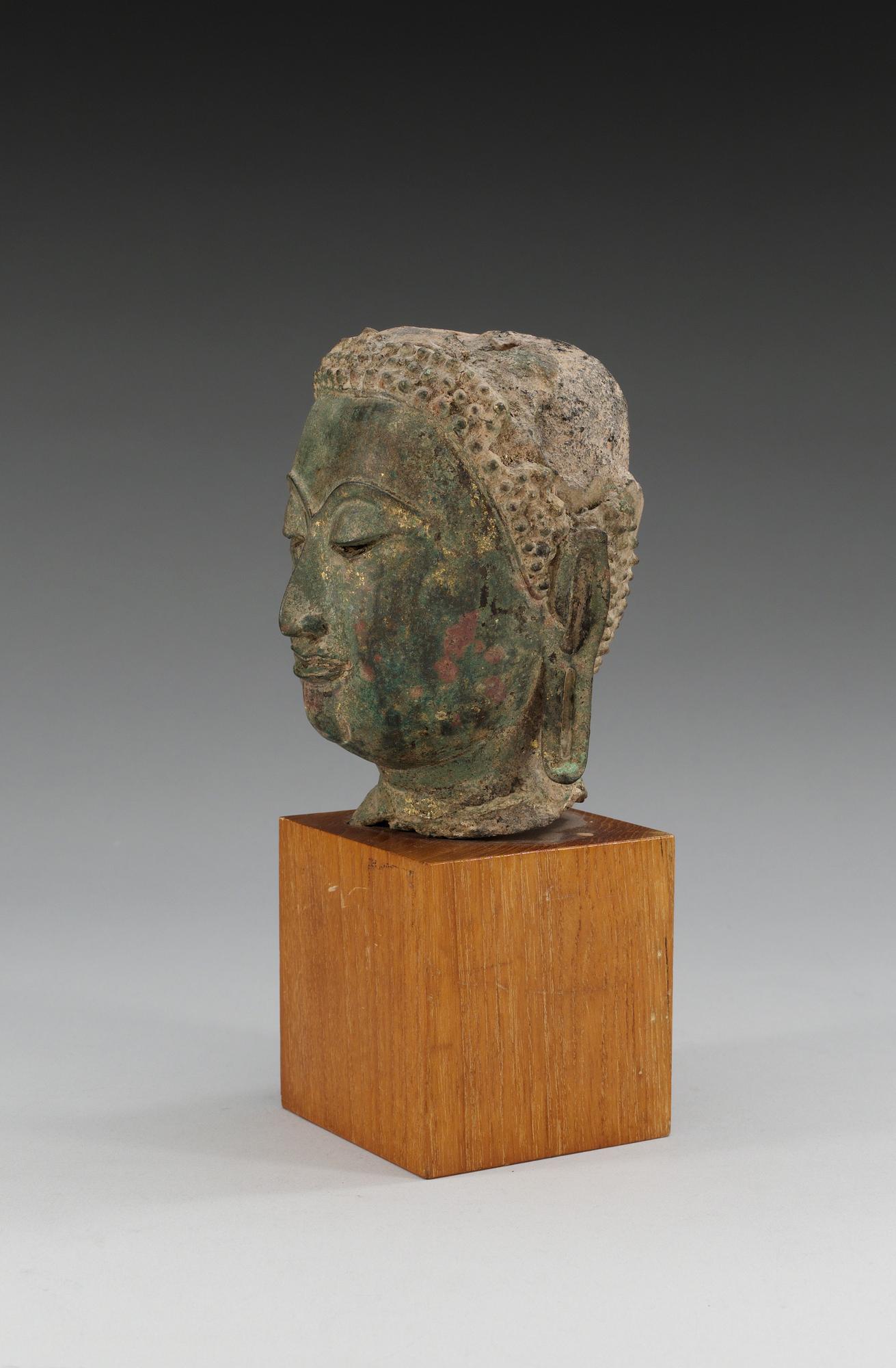 A bronze head of Buddha, Thailand, 18th Century.