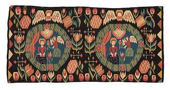 251. A carriage cushion, 'the Annunciation', tapestry weave, c. 100 x 48 cm, southwestern Scania, Sweden.