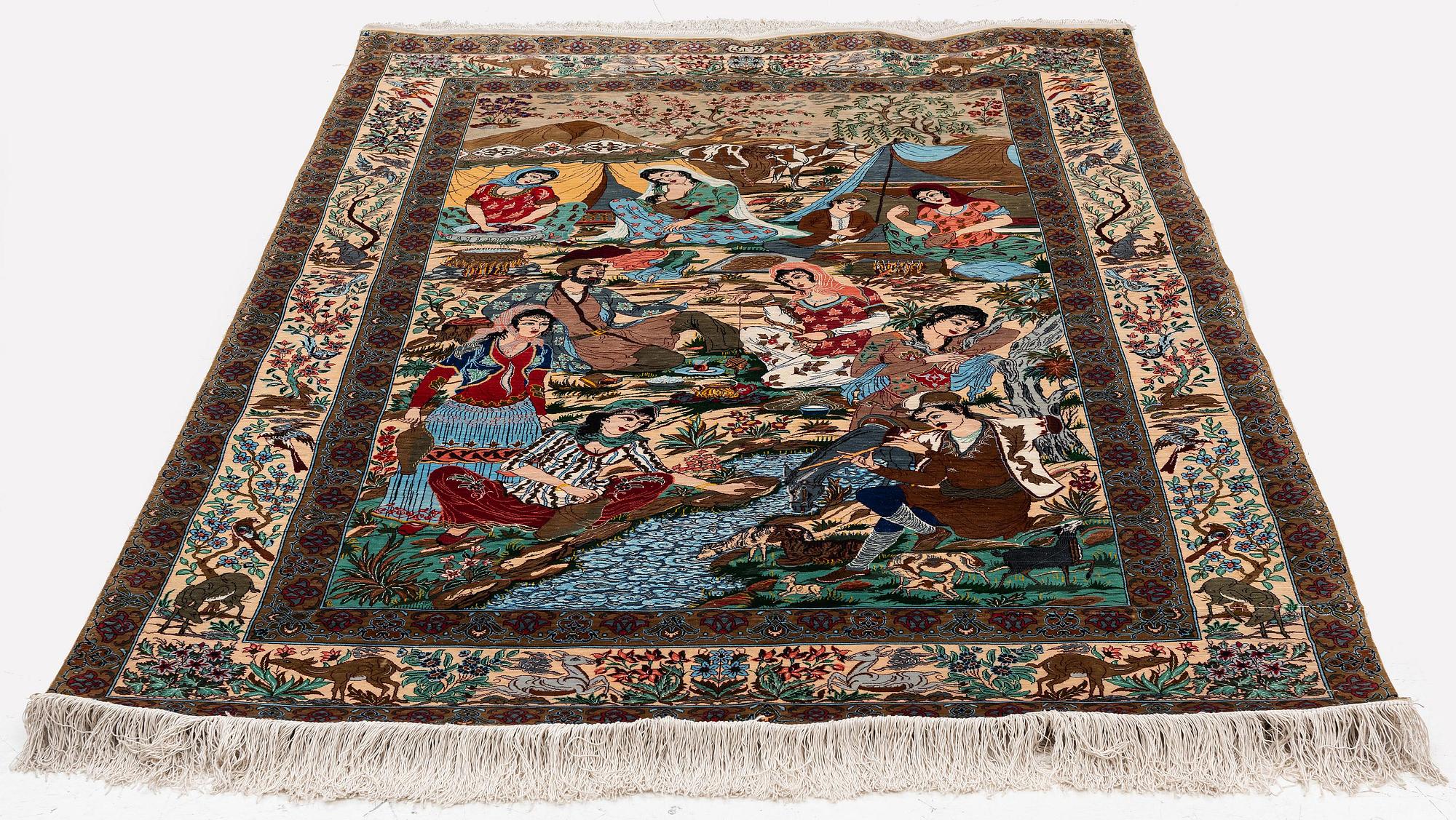 A silk Qum rug, Central Persia, signed, c. 135 x 208 cm.